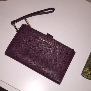 Micheal kors clutch wallet.